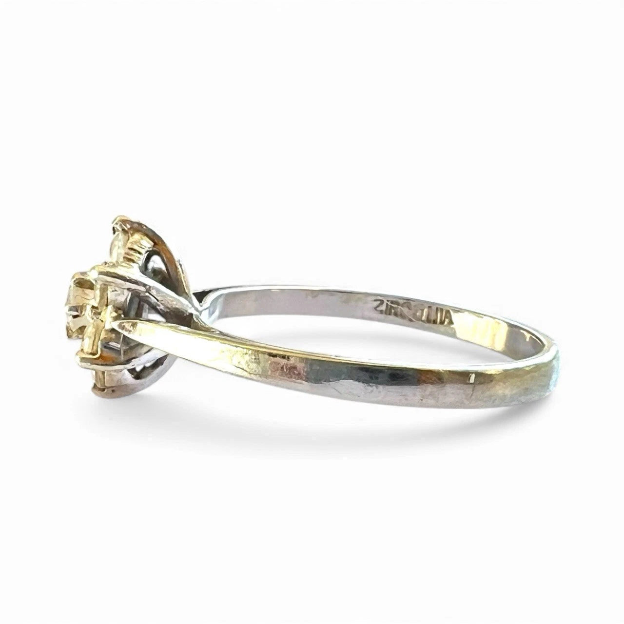 White gold ring on a white background
