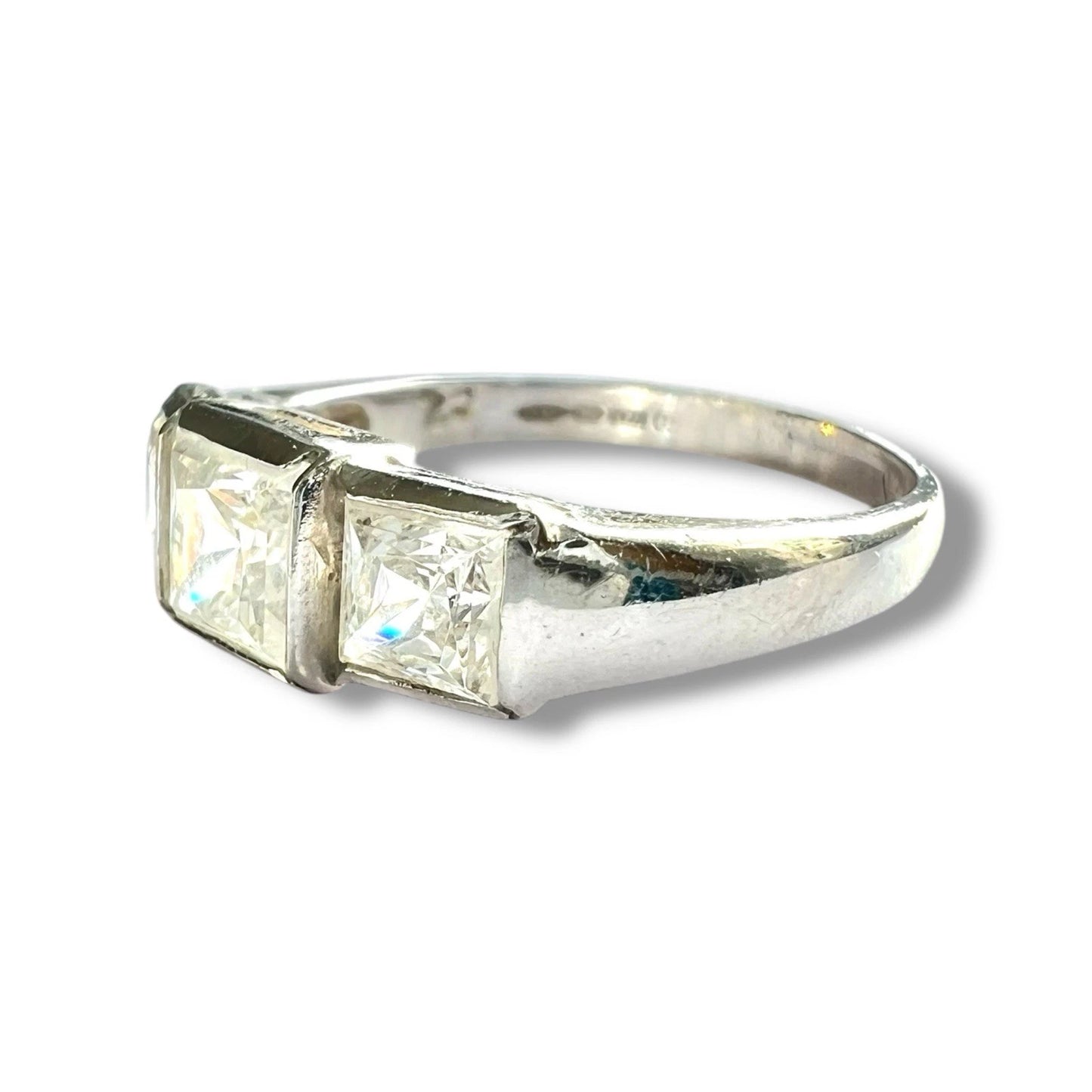 White gold ring with cubic zorconia on a white background