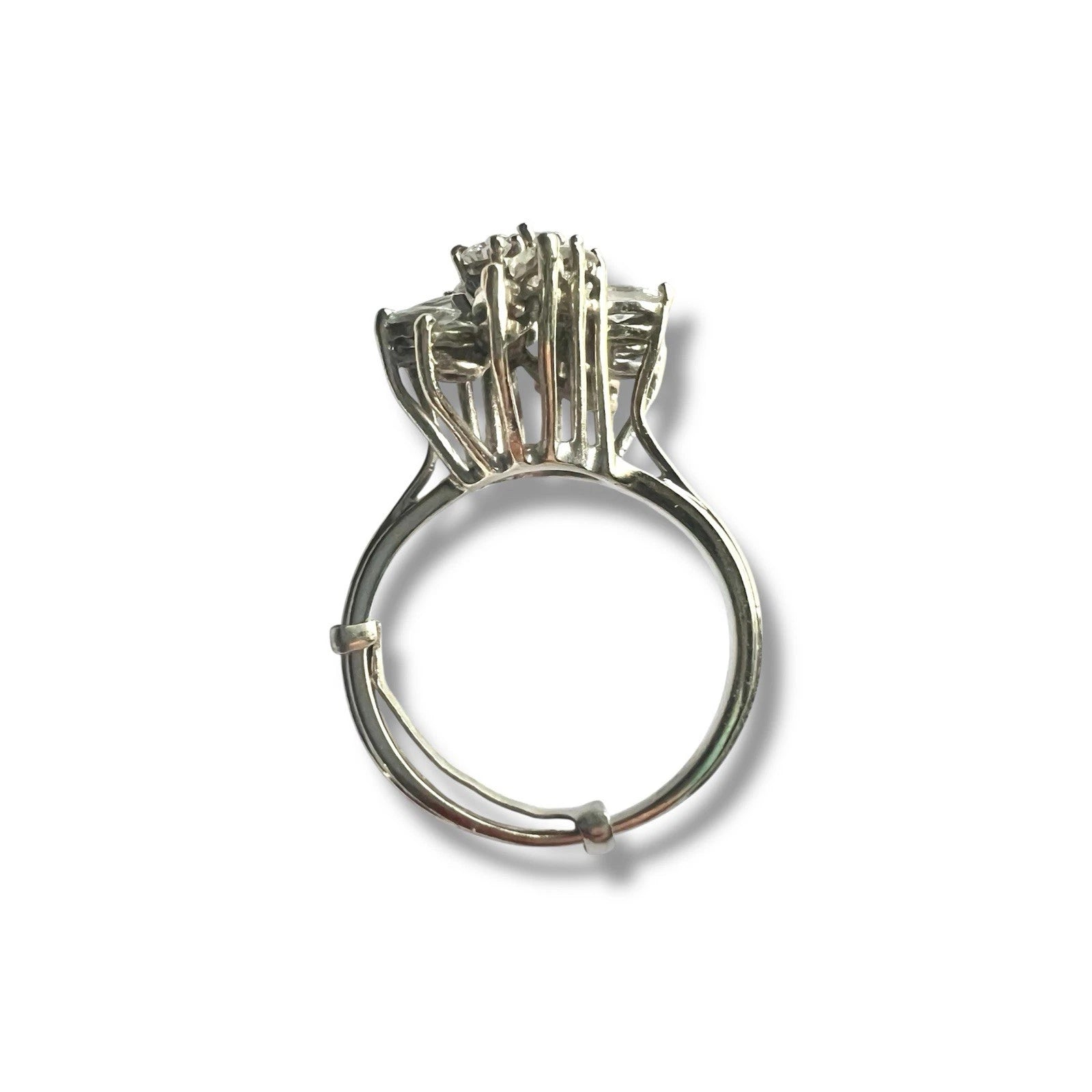 Silver ring with a decorative design on a white background