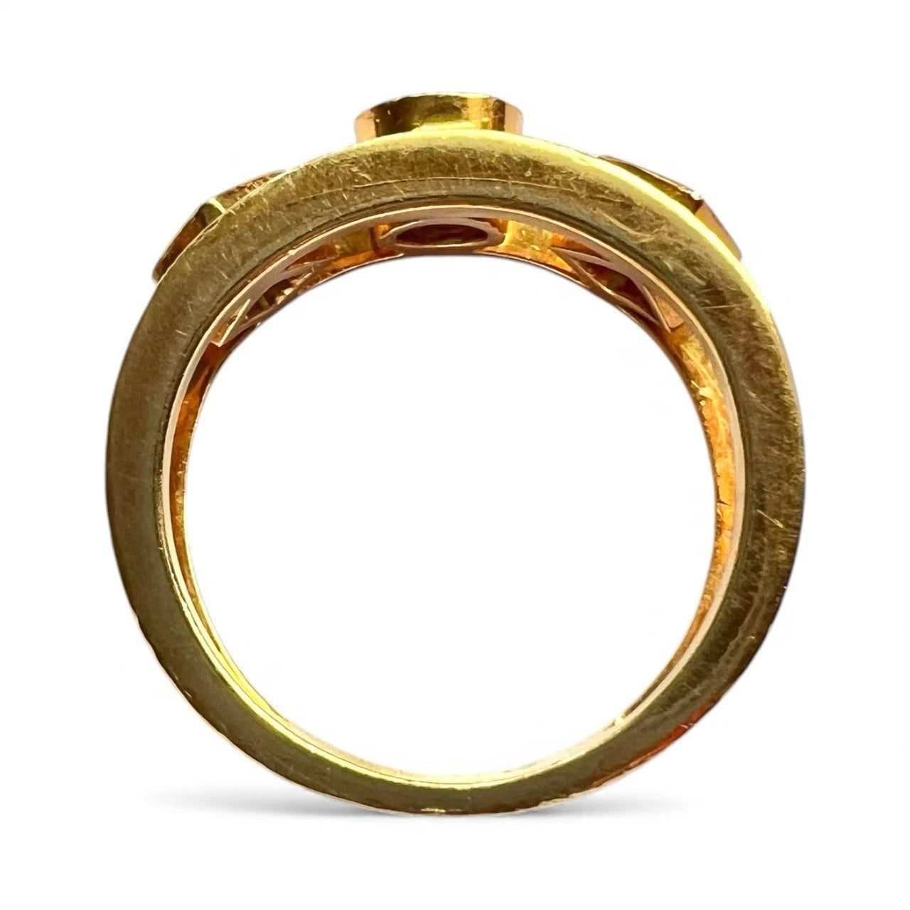 Gold diamond ring on a white background
