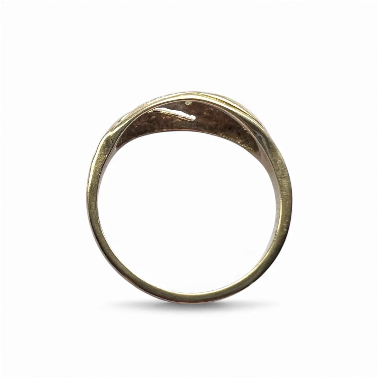 Gold ring on a white background top down view 
