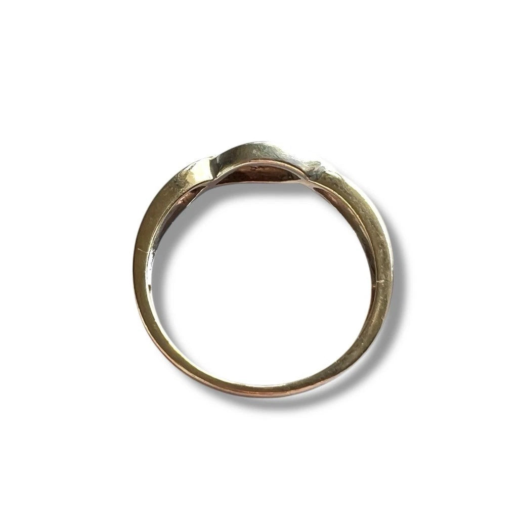 Gold ring on a white background