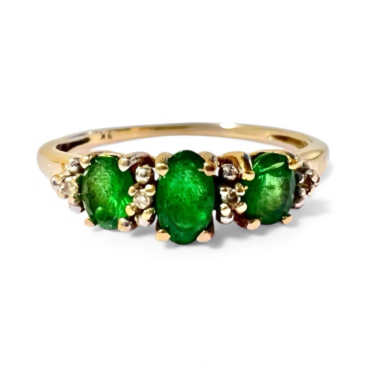 Green diopside and diamond ring close up front view on a white background 