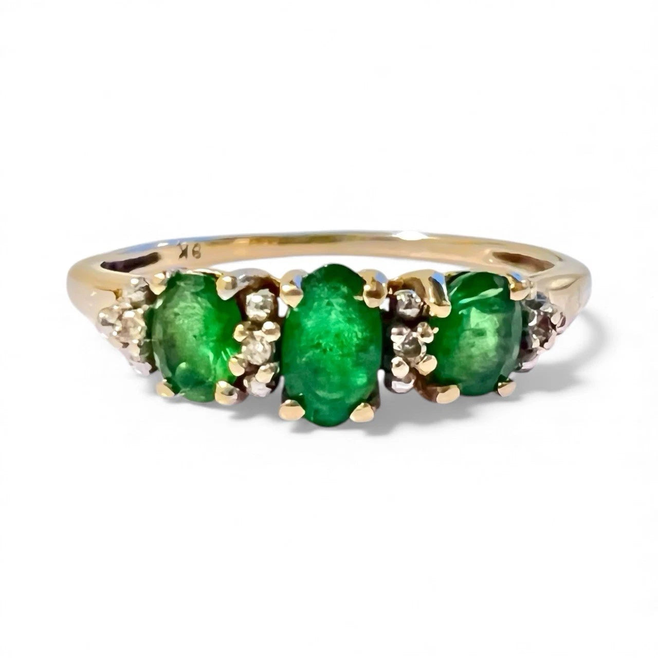 Gold Green diopside and diamond ring close up front view on white background 