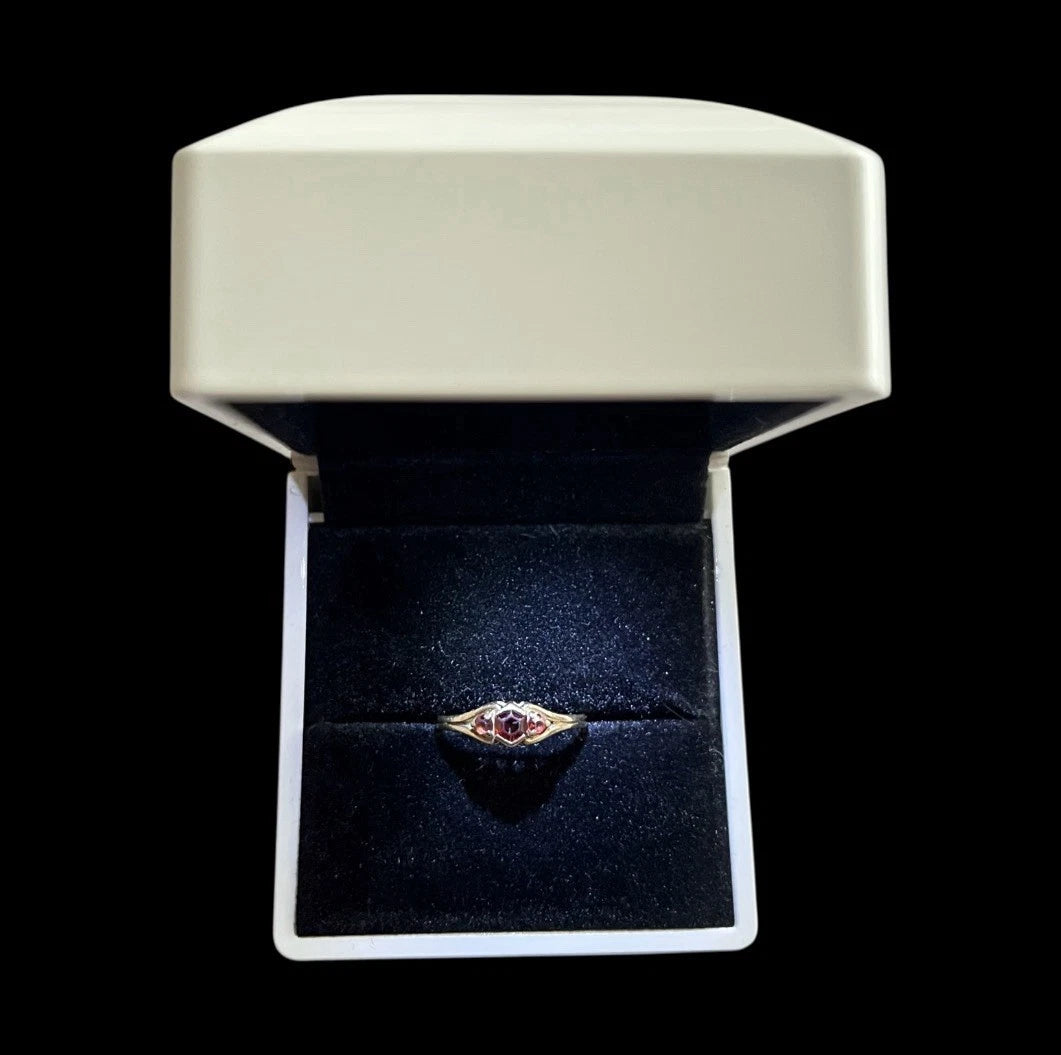 Jewelry box with a ring on a black background