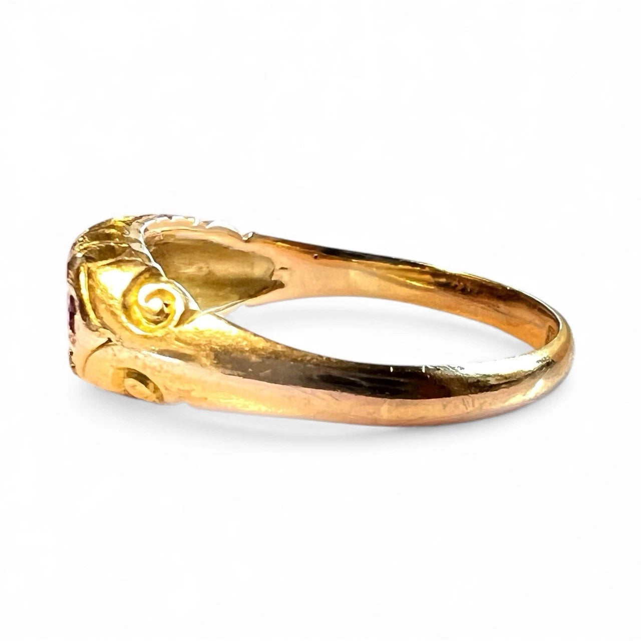 Antique Gold ring with a spiral design on a white background