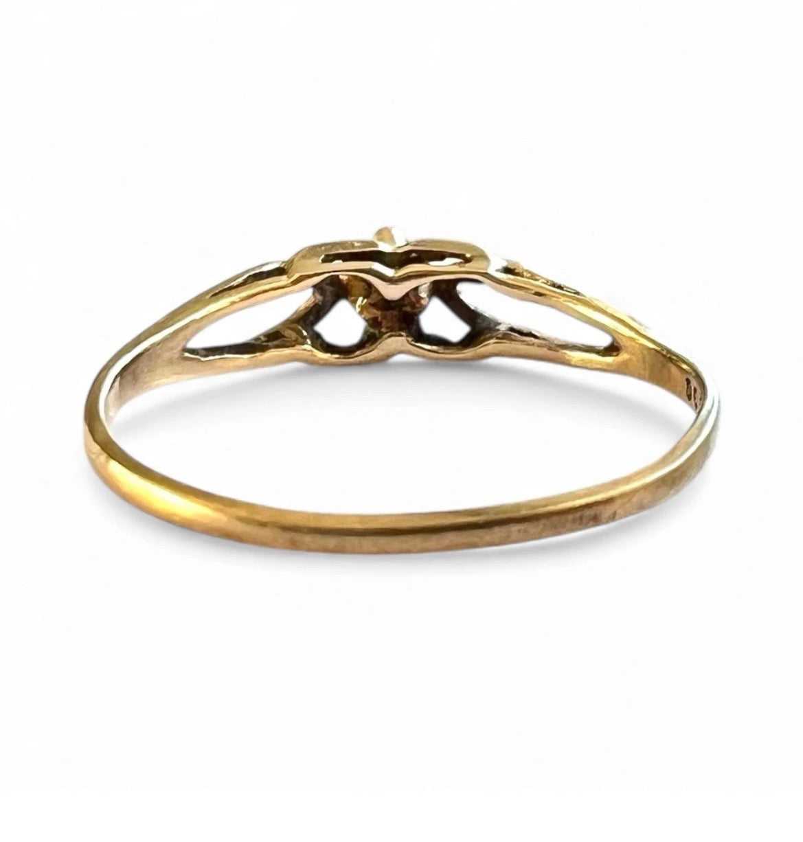 Rear view setting and gold band, gold ring with sapphire on a white background