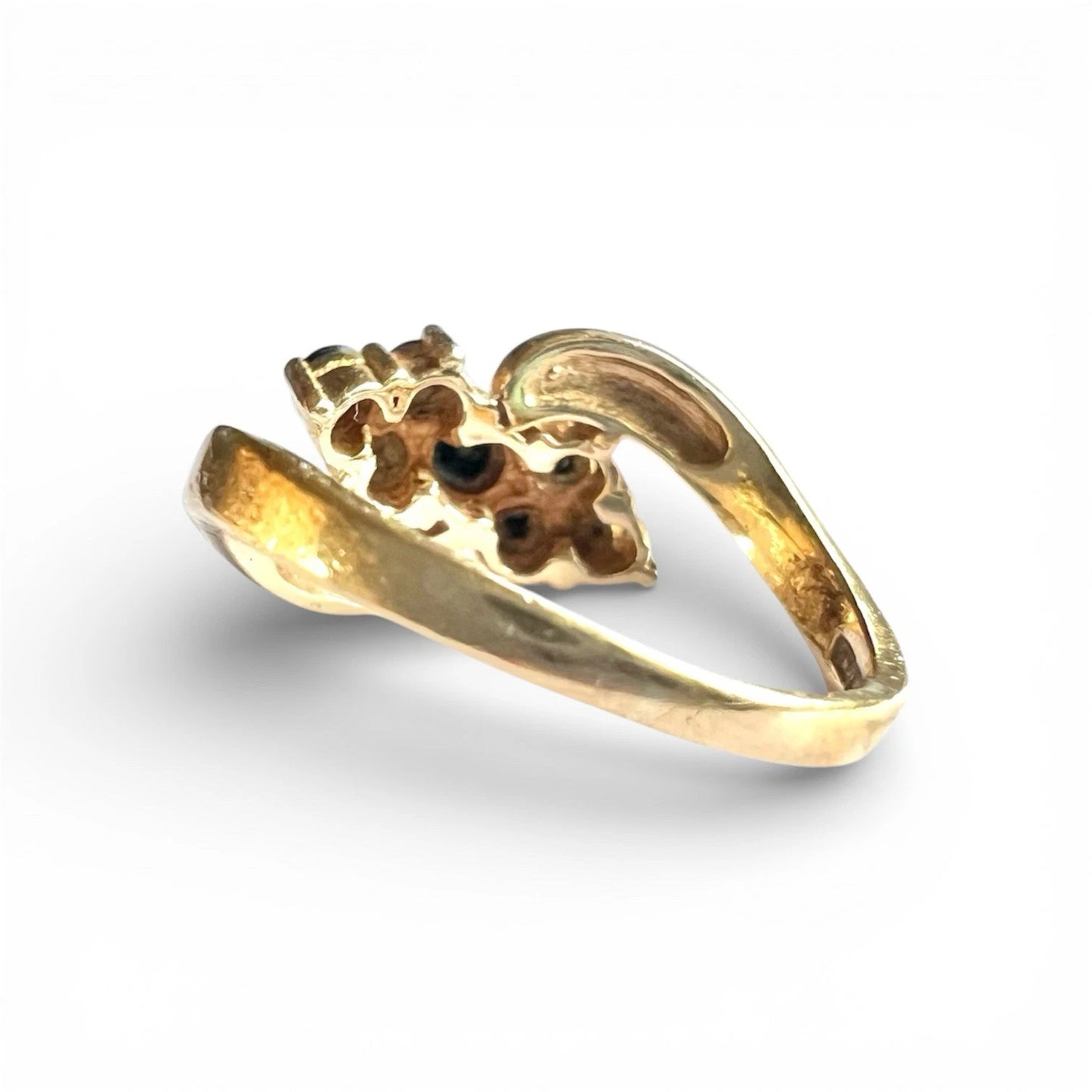 Gold sapphire cluster ring rear view on a white background