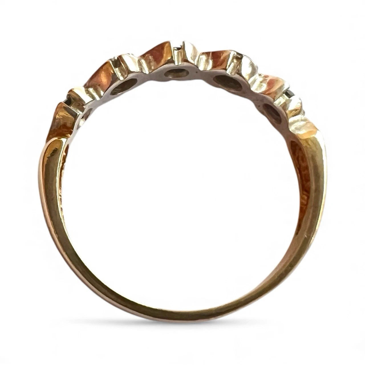 Gold ring on a white background