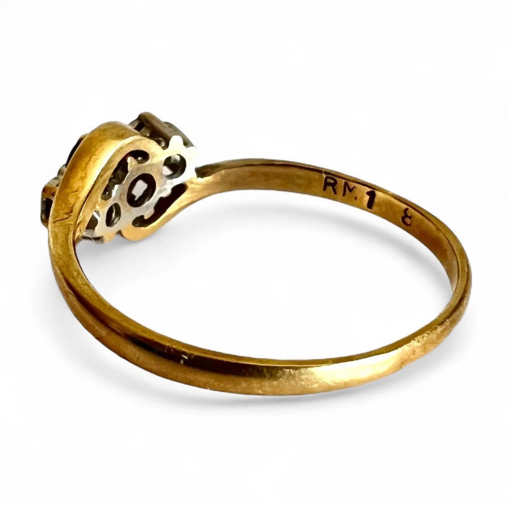 Gold ring with on a white background