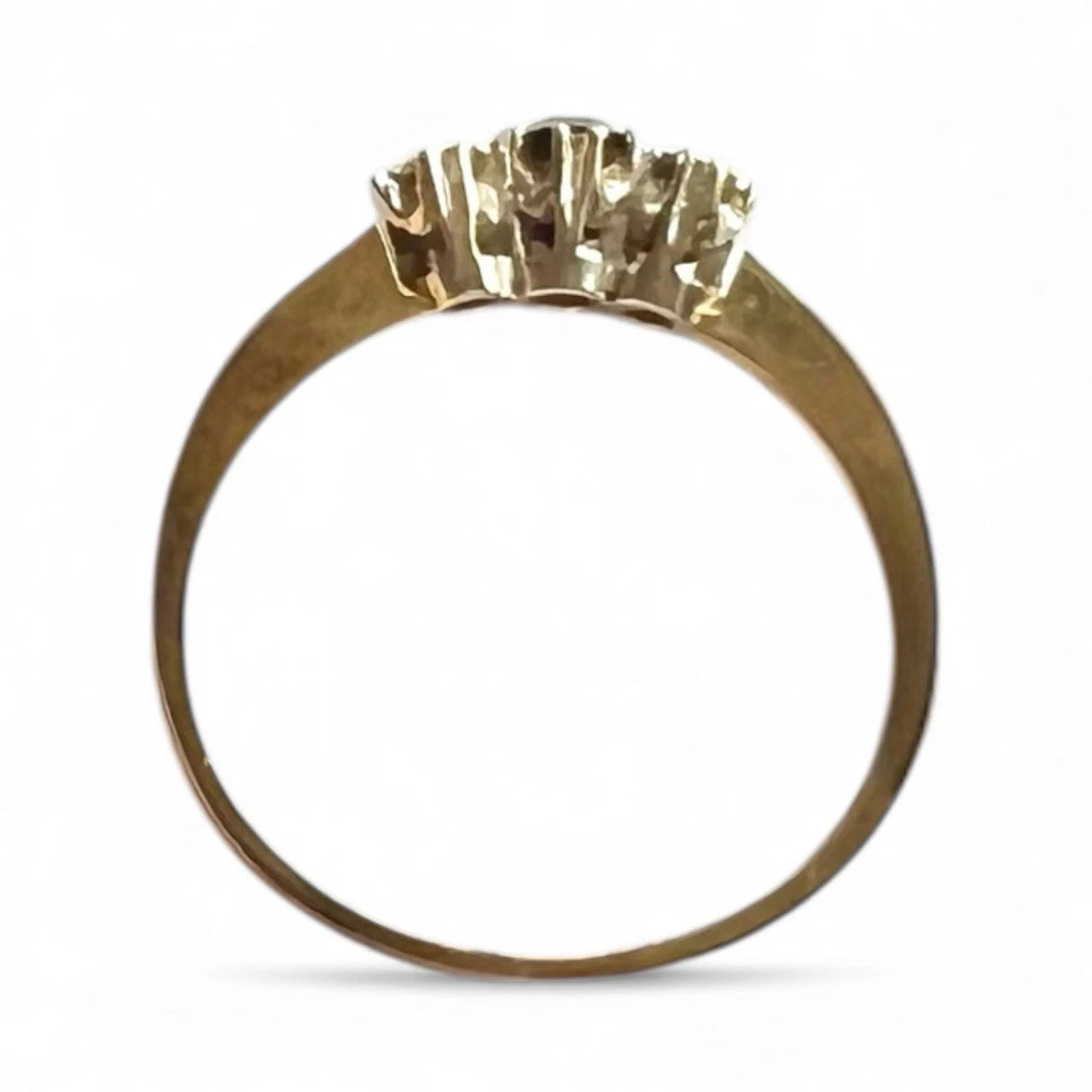 Gold ring on a white background