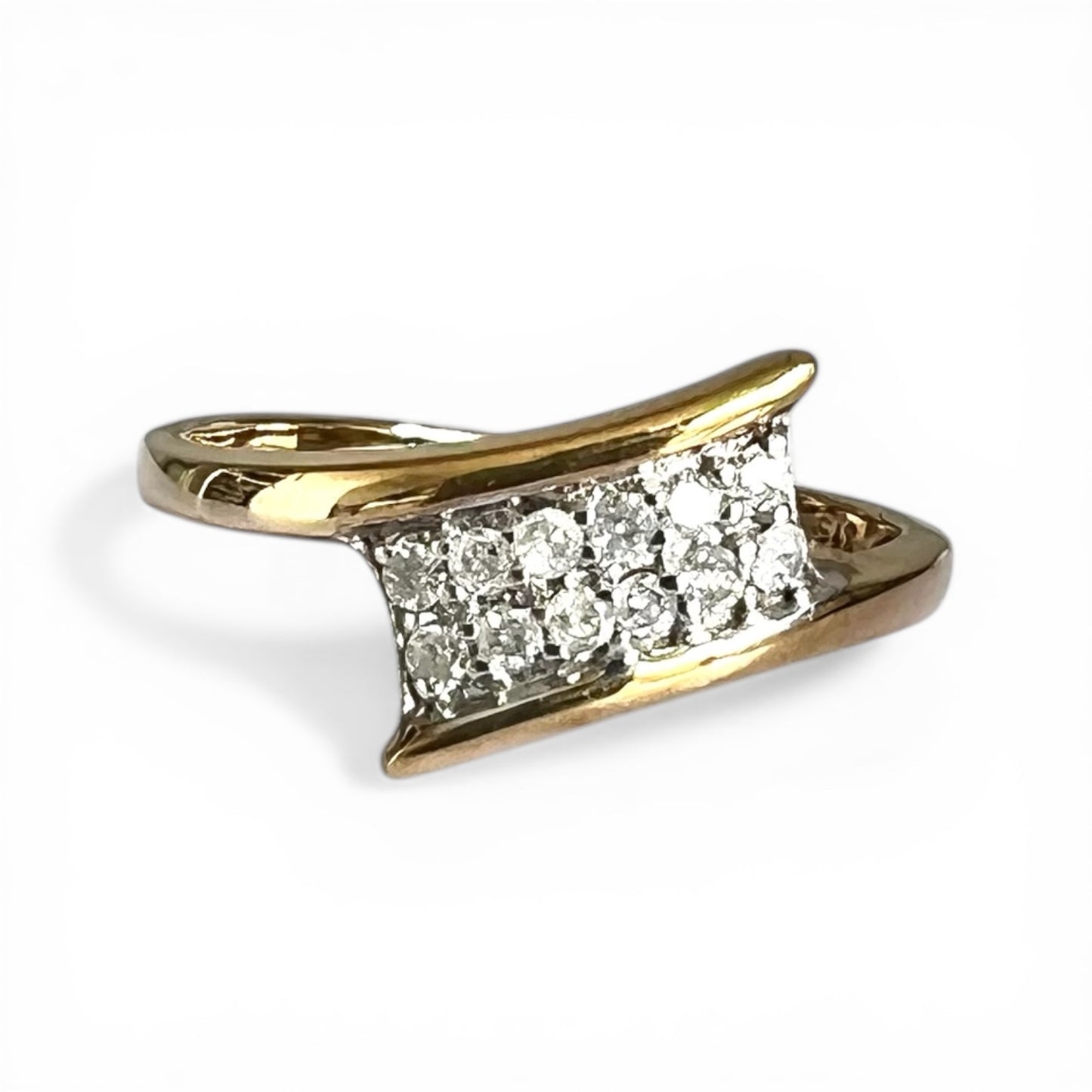 Gold ring with three diamonds on a white background