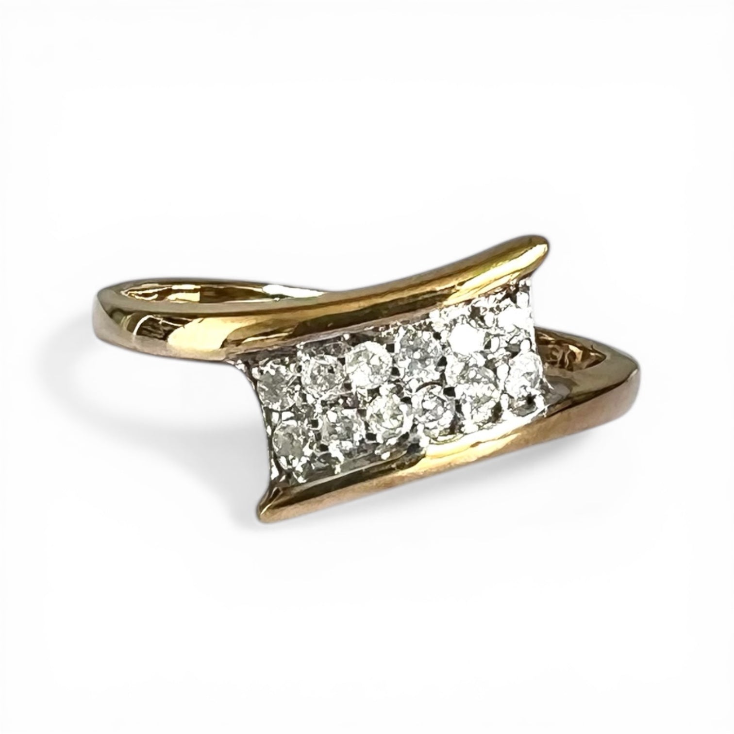 Gold ring with three diamonds on a white background