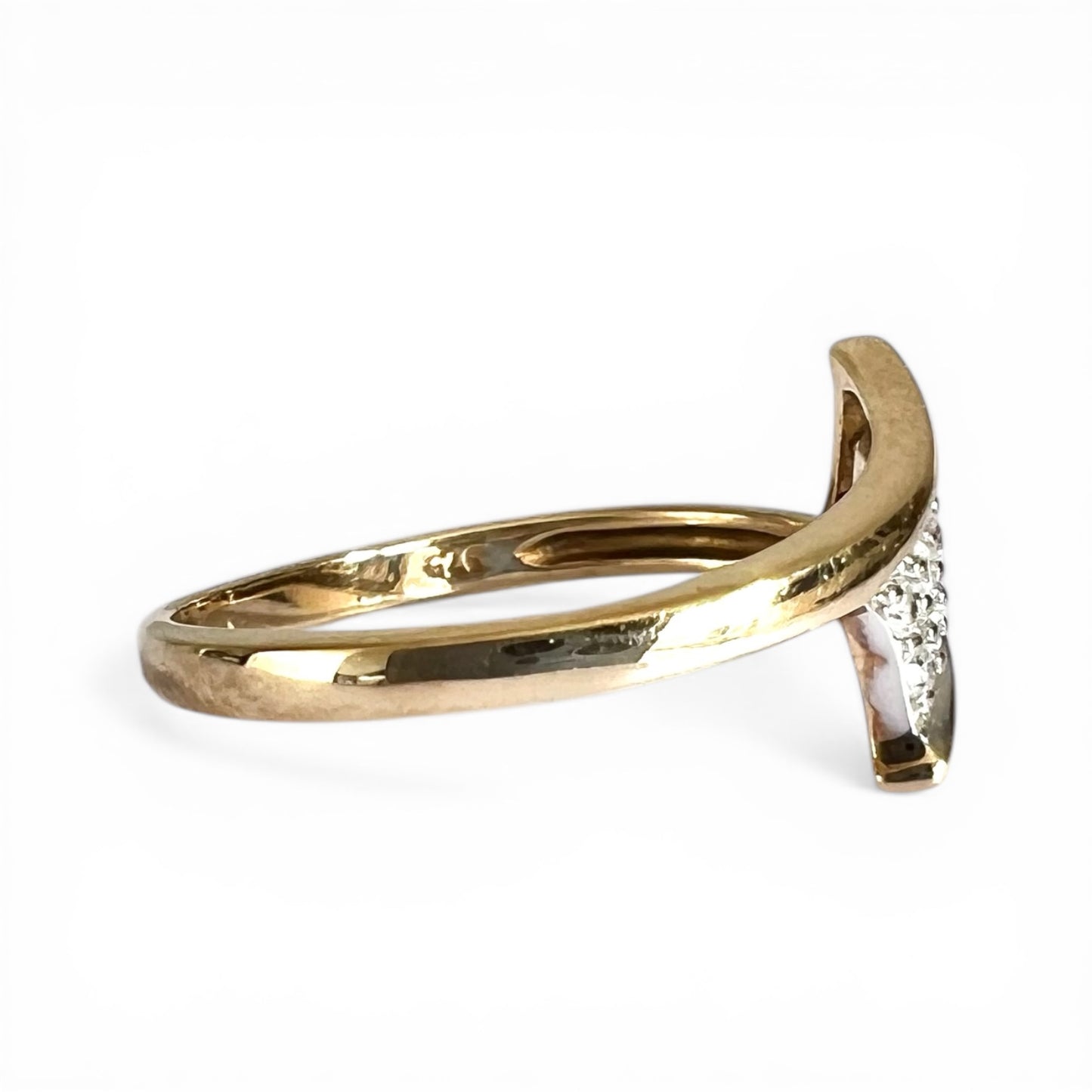 Gold ring with a diamond on a white background close up size view 