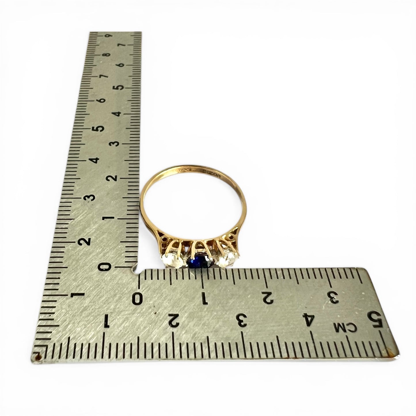 Vintage 9ct Gold Sapphire Trilogy Ring – Three Stone Design, Size P 1/2 Next to measuring ruler to show size 